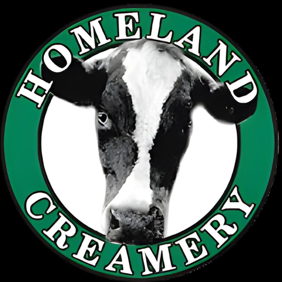 Homeland Creamery logo featuring a black and white cow's head inside a green circle with text.